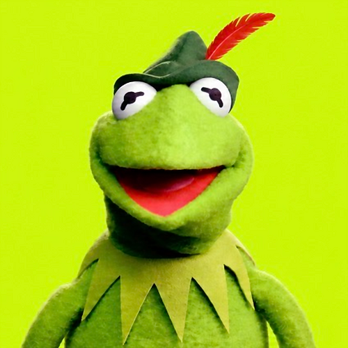 Kermit wearing a green hat with a red feather